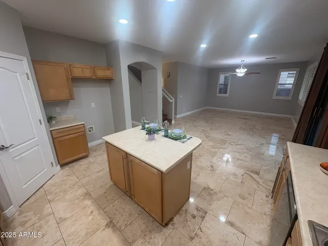 a bathroom with a sink a toilet a mirror and vanity