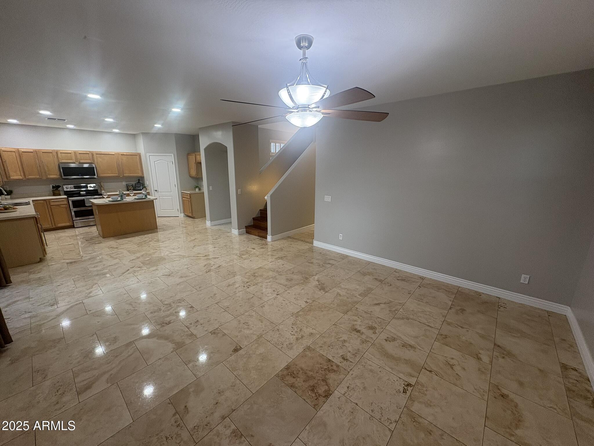 17633 North 41st Street Phoenix, AZ 85032 - Photo 9 of 24 a view of a projector room with a ceiling fan