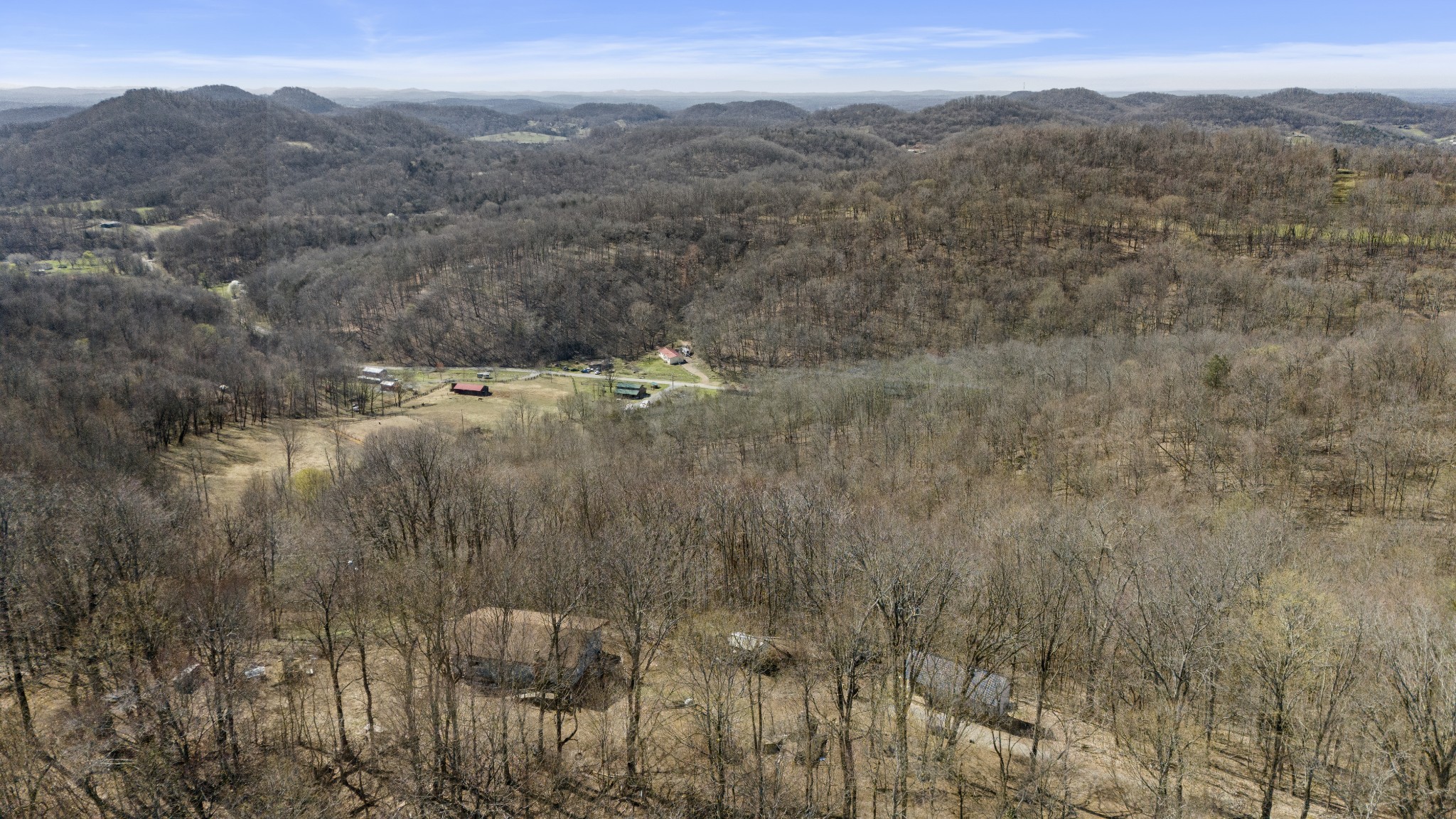 1480 Gravel Hill Road Bethpage, TN 37022 - Photo 21 of 26 a view of a dry yard with mountains in the background