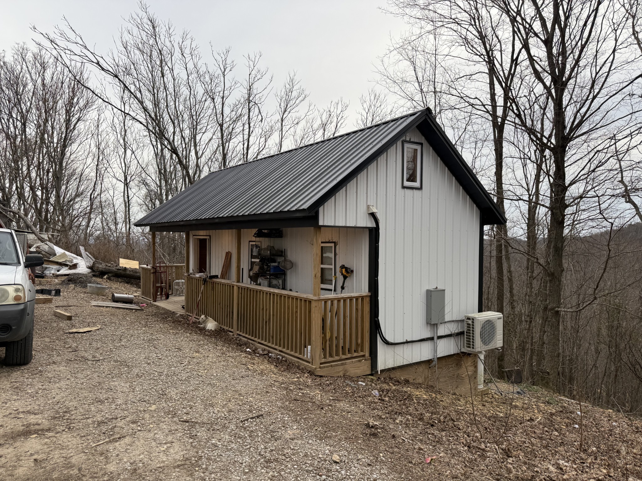 1480 Gravel Hill Road Bethpage, TN 37022 - Photo 6 of 26 a view of a house with a yard and trees