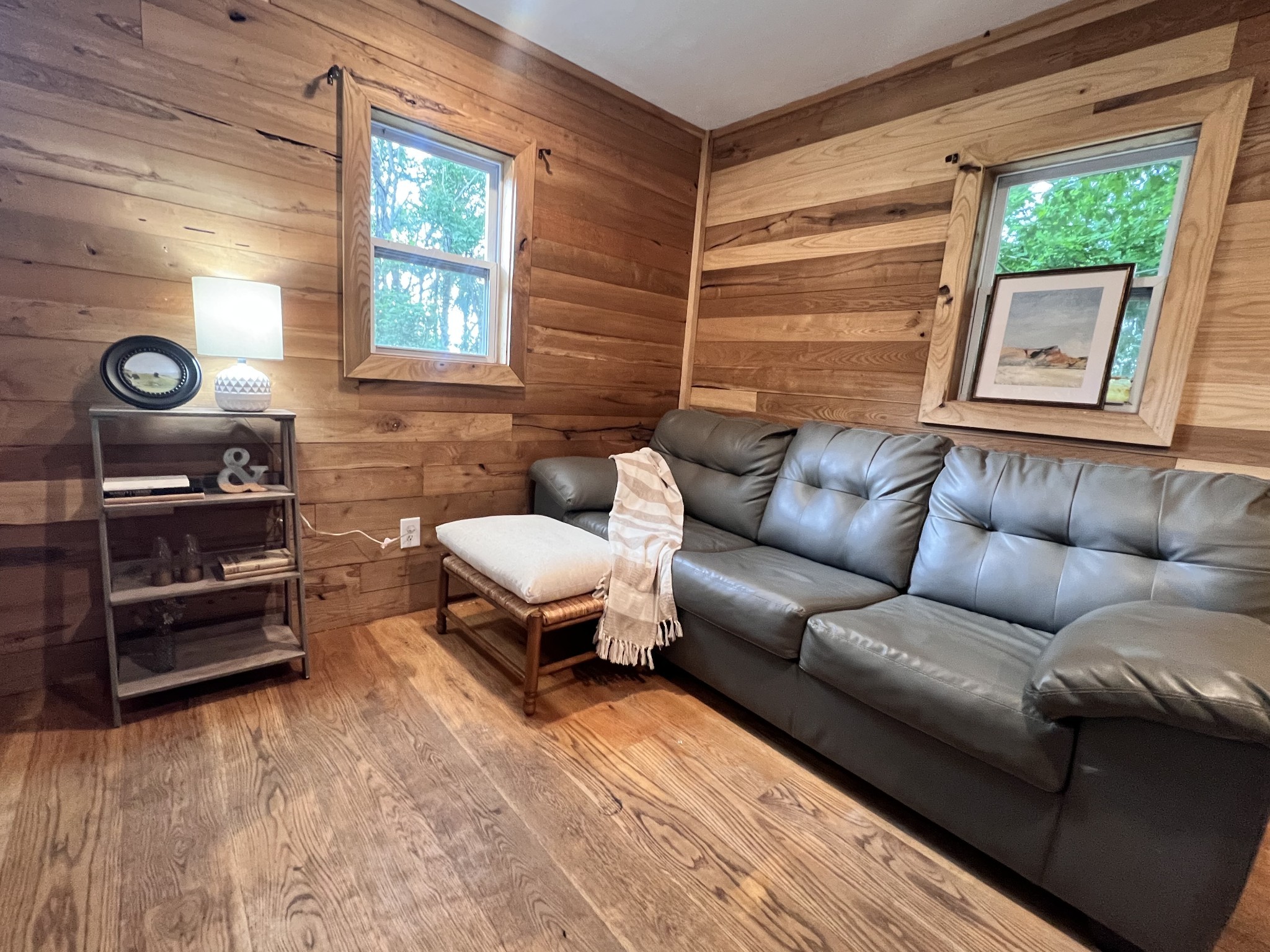 1480 Gravel Hill Road Bethpage, TN 37022 - Photo 7 of 26 a living room with furniture a window and a flat screen tv
