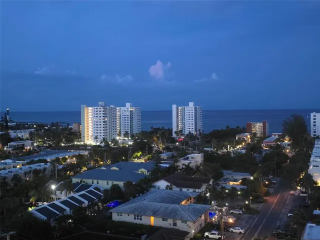 a city view with lot of car parked