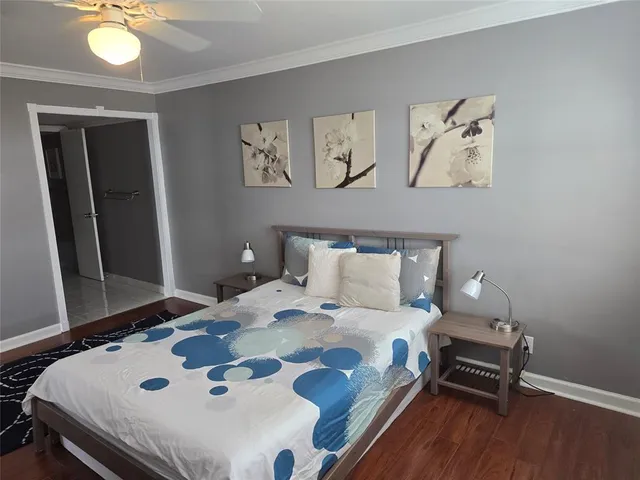 a bedroom with a bed and a table