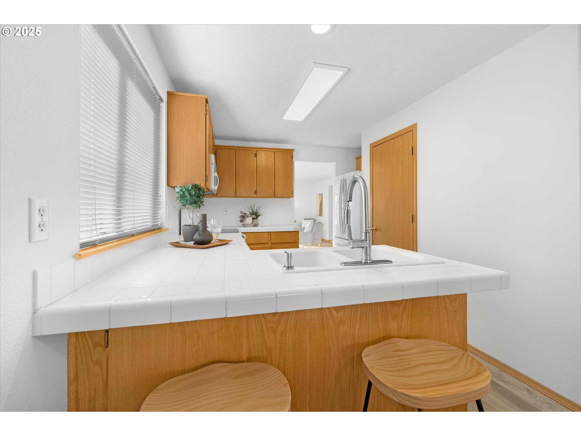 14029 Southeast Summerfield Loop Happy Valley, OR 97086 - Photo 12 of 47 a bathroom with a sink and a mirror