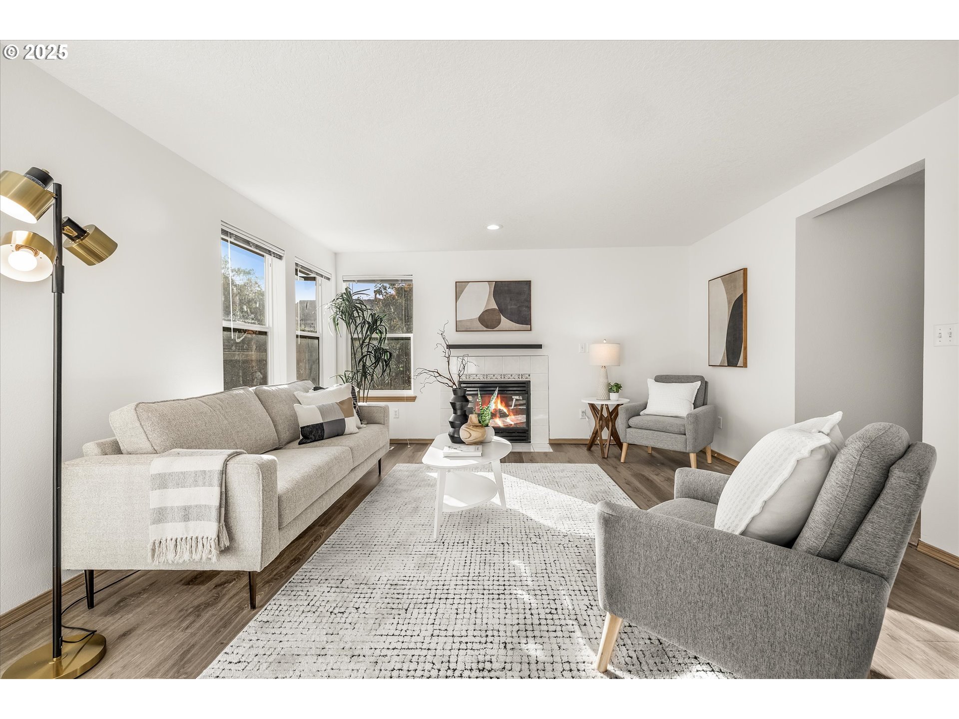 14029 Southeast Summerfield Loop Happy Valley, OR 97086 - Photo 15 of 47 a living room with furniture and a fireplace