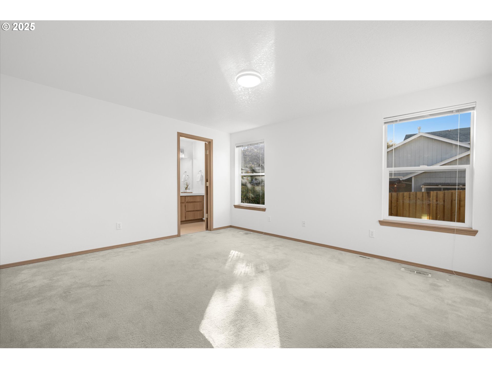 14029 Southeast Summerfield Loop Happy Valley, OR 97086 - Photo 20 of 47 a view of an empty room with a window