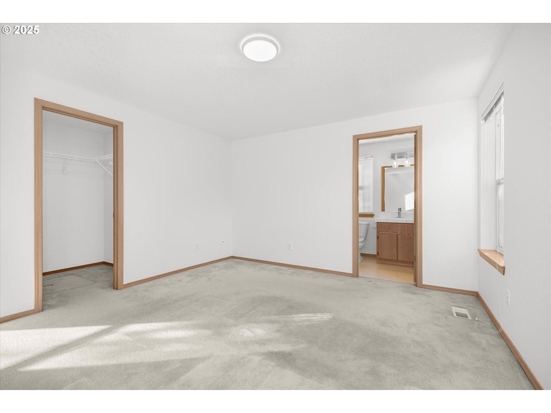 14029 Southeast Summerfield Loop Happy Valley, OR 97086 - Photo 21 of 47 a view of an empty room and closet