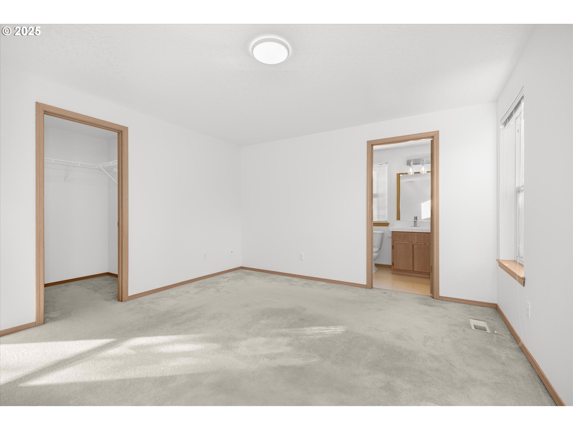 14029 Southeast Summerfield Loop Happy Valley, OR 97086 - Photo 22 of 47 a view of an empty room and kitchen
