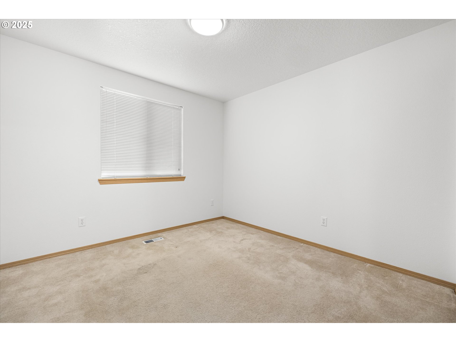 14029 Southeast Summerfield Loop Happy Valley, OR 97086 - Photo 27 of 47 a view of an empty room