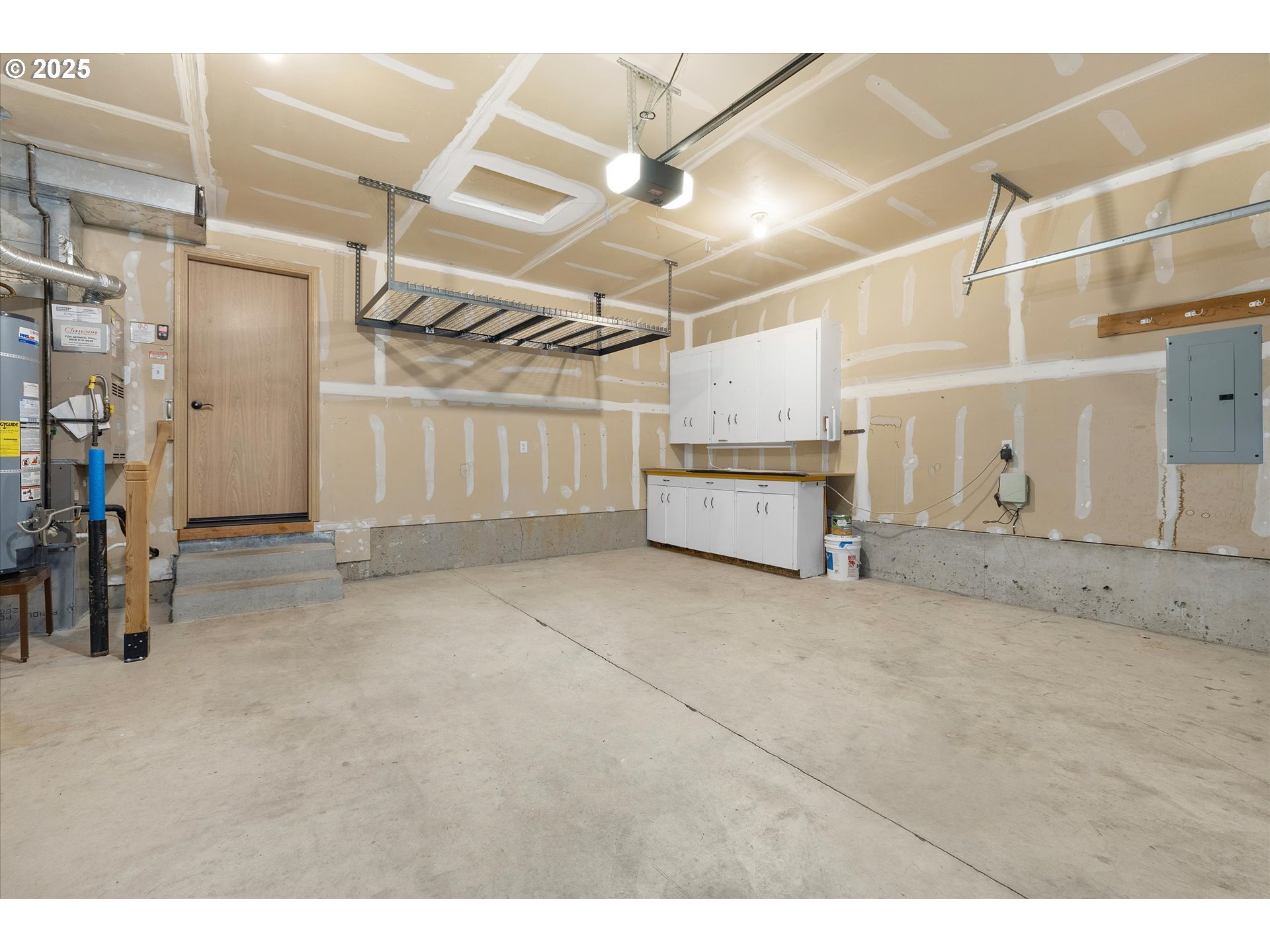 14029 Southeast Summerfield Loop Happy Valley, OR 97086 - Photo 30 of 47 a view of a garage