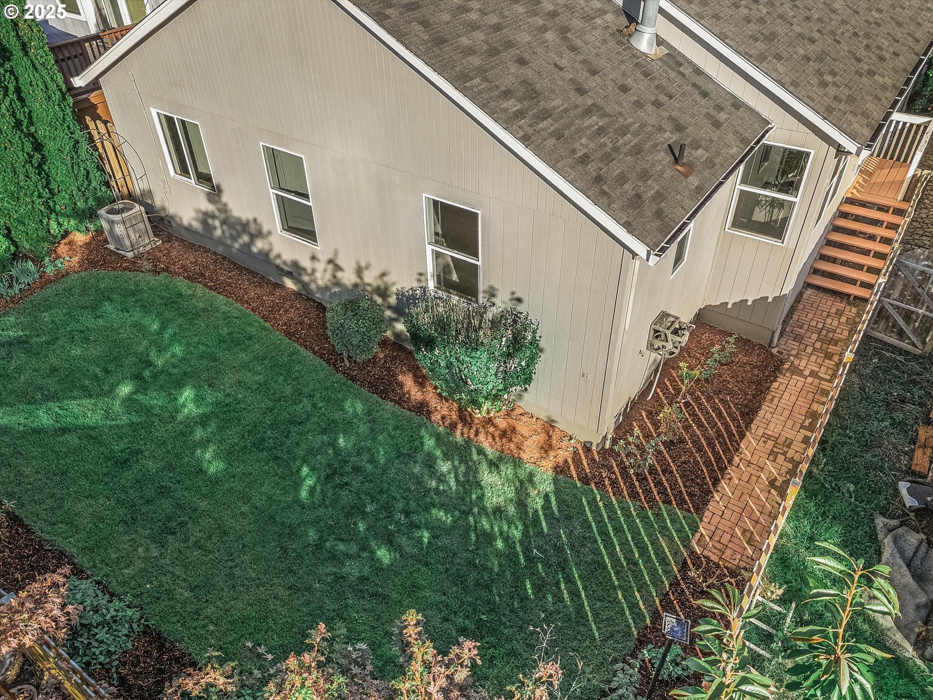 14029 Southeast Summerfield Loop Happy Valley, OR 97086 - Photo 32 of 47 a aerial view of a house with a yard