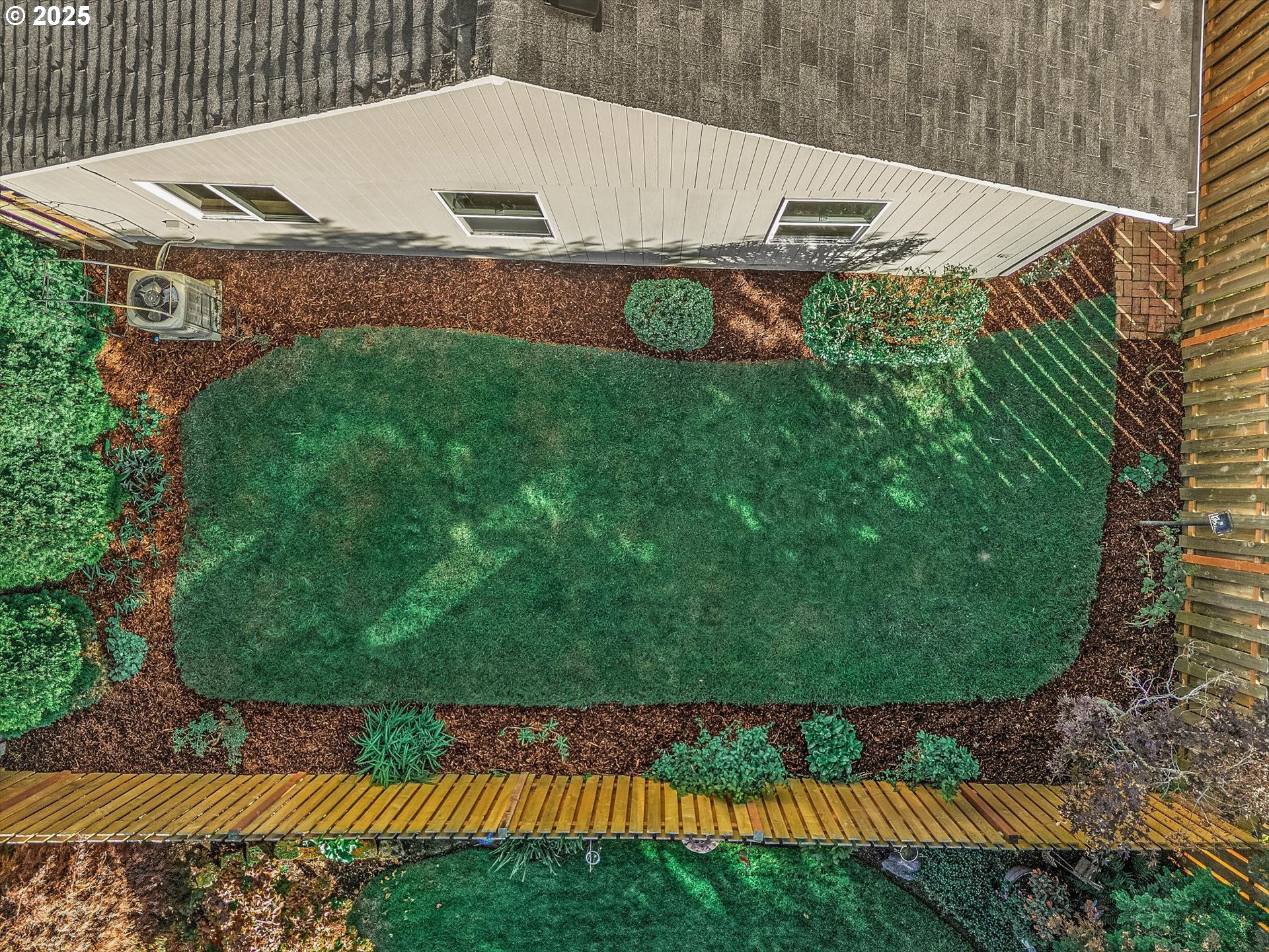 14029 Southeast Summerfield Loop Happy Valley, OR 97086 - Photo 33 of 47 a view of backyard with swimming pool