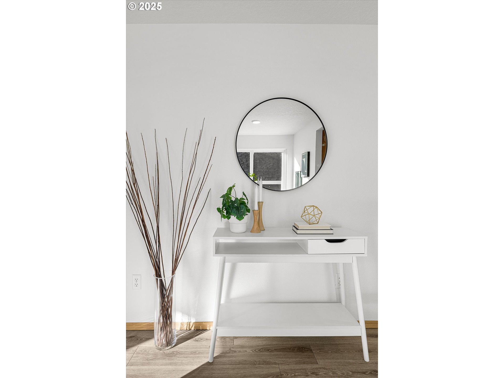 14029 Southeast Summerfield Loop Happy Valley, OR 97086 - Photo 8 of 47 a view of living room with mirror and cabinets