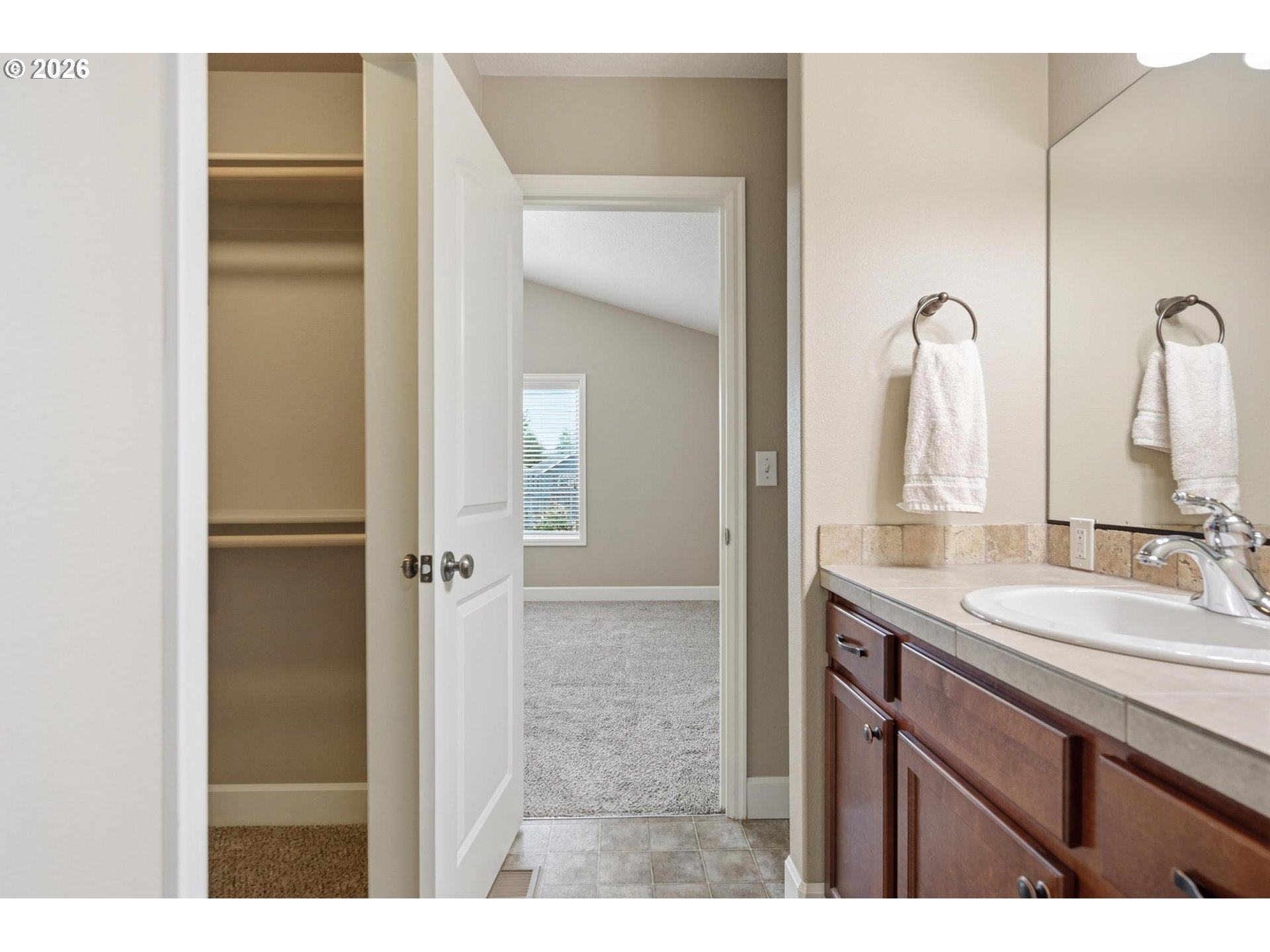 1075 Sage Street Silverton, OR 97381 - Photo 22 of 46 a bathroom with a sink and a mirror