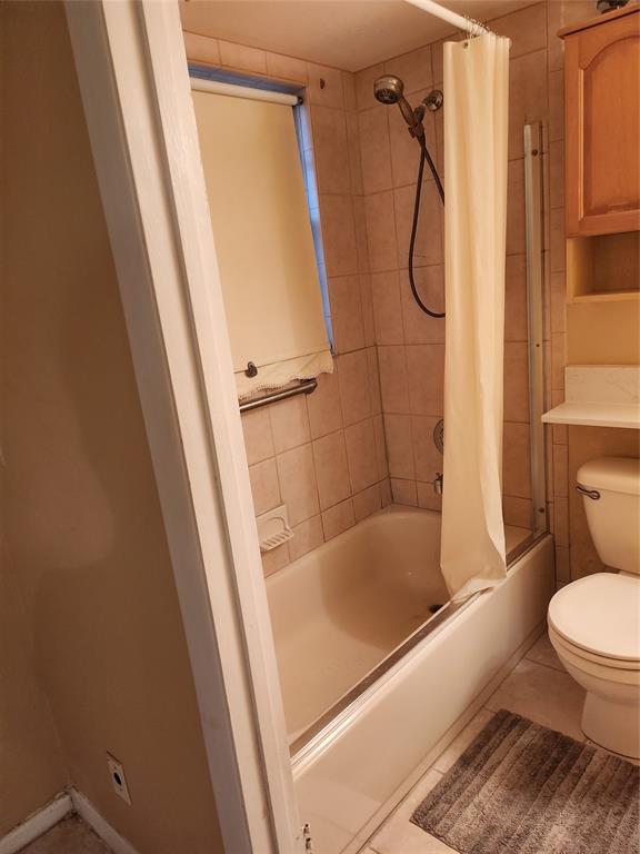 104 Westbury East, Unit 104 Deerfield Beach, FL 33442 - Photo 18 of 40 a bathroom with a tub and a shower