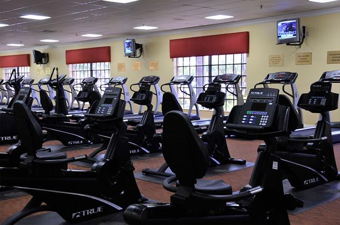 104 Westbury East, Unit 104 Deerfield Beach, FL 33442 - Photo 30 of 40 a room with gym equipment and a window