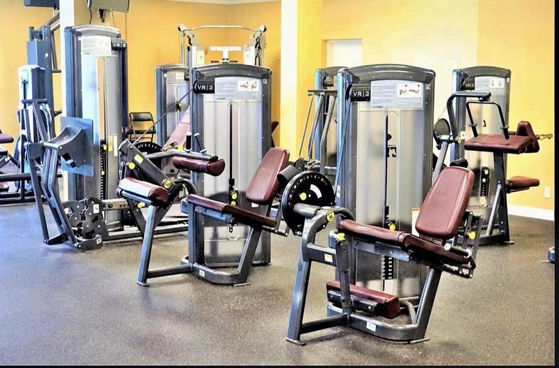 104 Westbury East, Unit 104 Deerfield Beach, FL 33442 - Photo 31 of 40 a view of a room with gym equipment