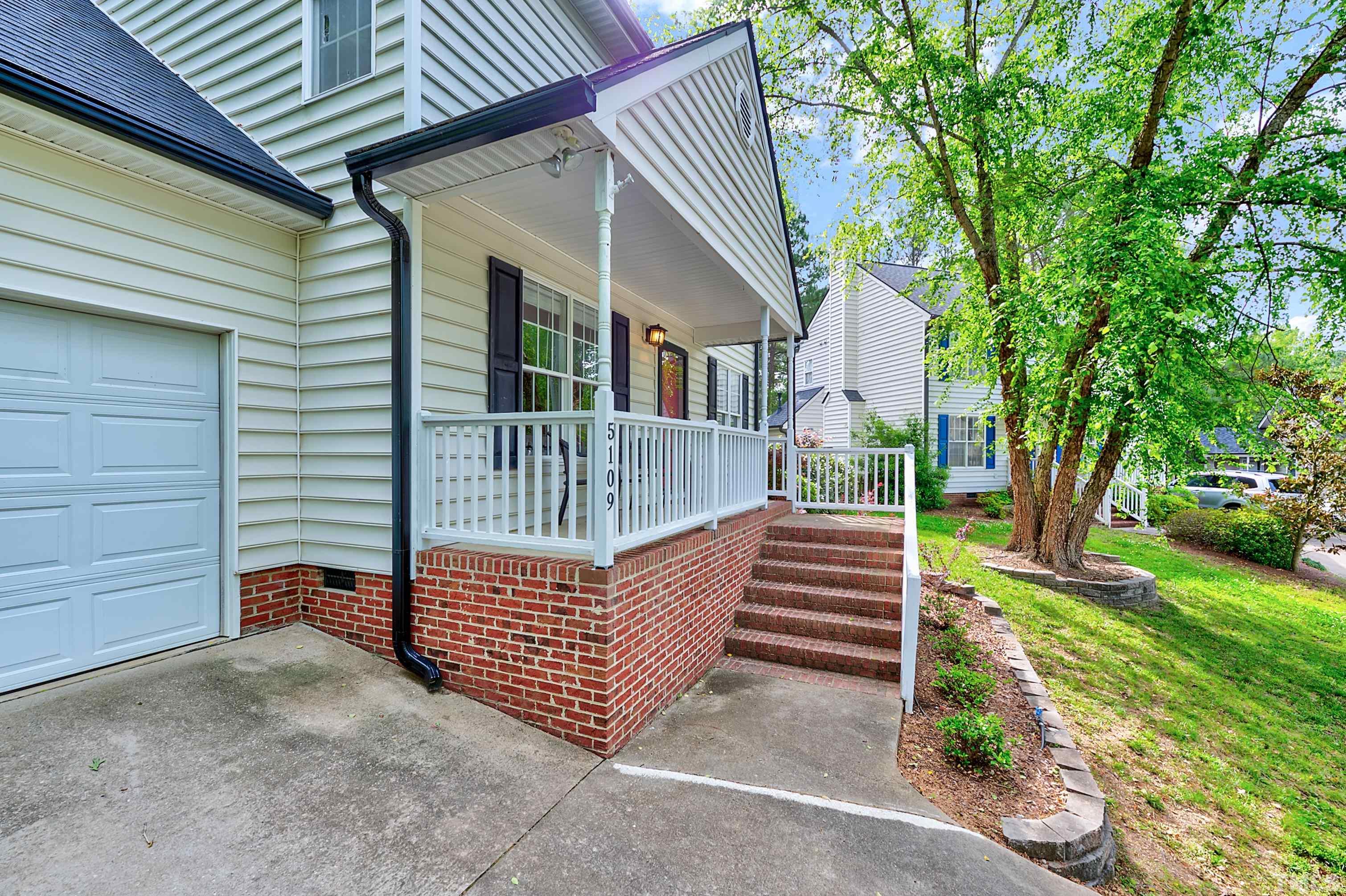5109 Antler Ridge Court Raleigh, NC 27616 - Photo 4 of 30 a view of stairs and yard with green space