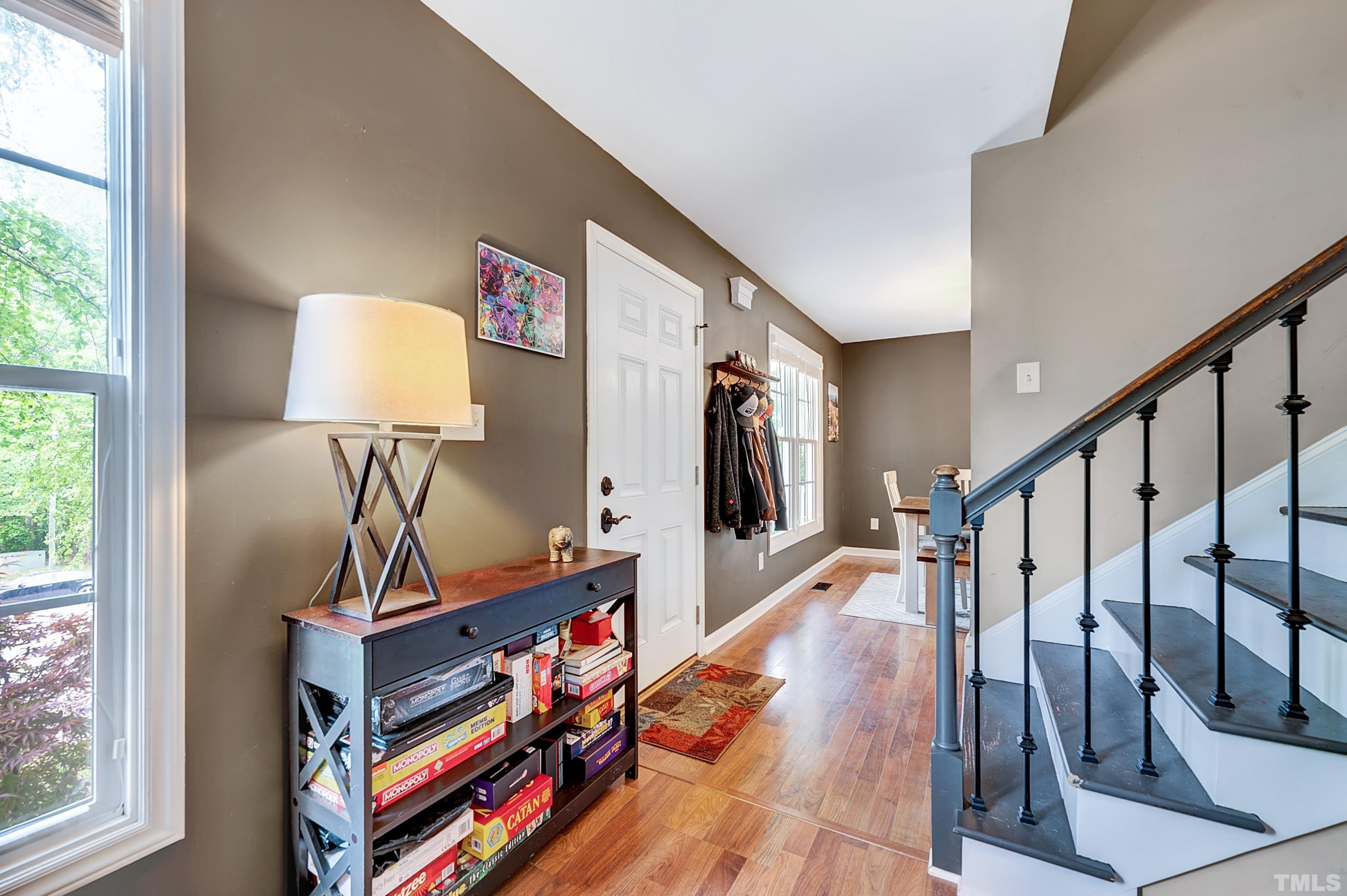 5109 Antler Ridge Court Raleigh, NC 27616 - Photo 6 of 30 a room with lots of books and furniture