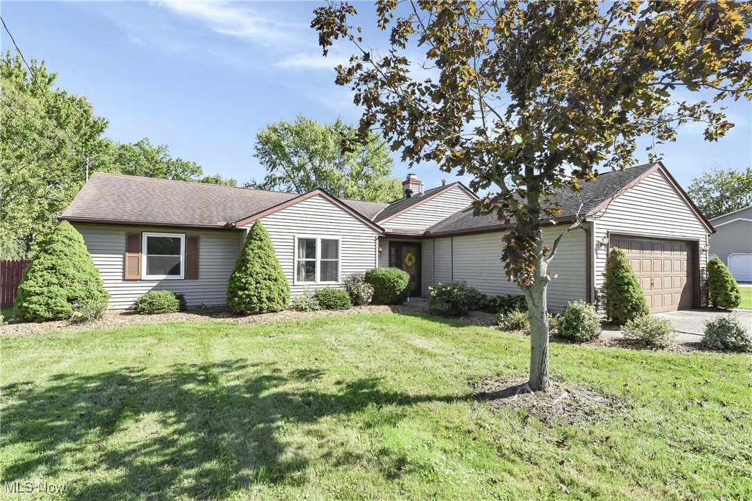 5141 Jaycox Road North Ridgeville, OH 44039 - Photo 1 of 36 Single story home featuring a garage and a front lawn