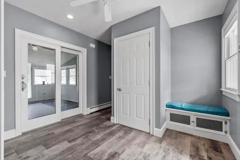 an entryway at livingroom with furniture and window