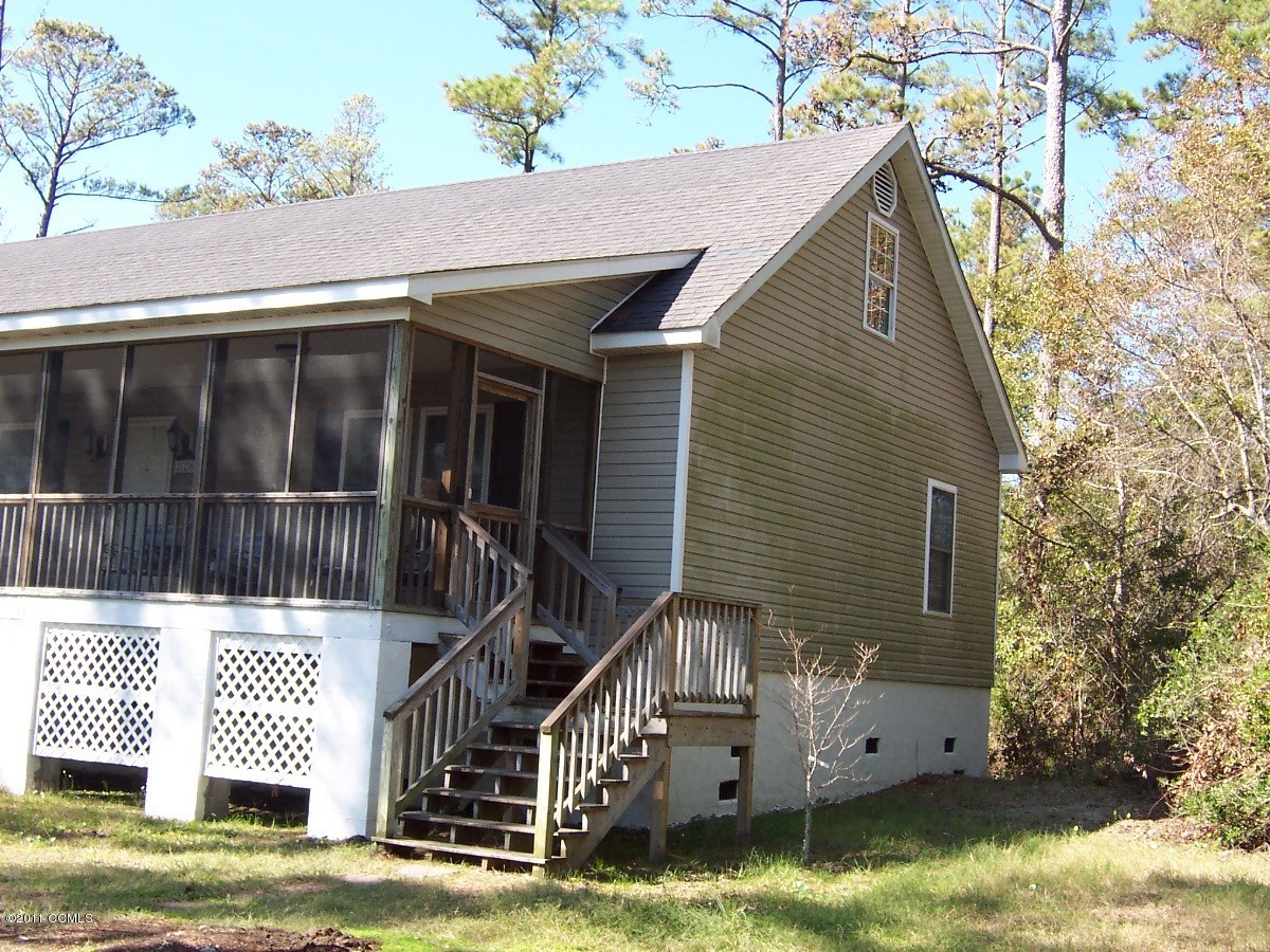 226 Community Road Davis, NC 28524 - Photo 23 of 25 North side of house