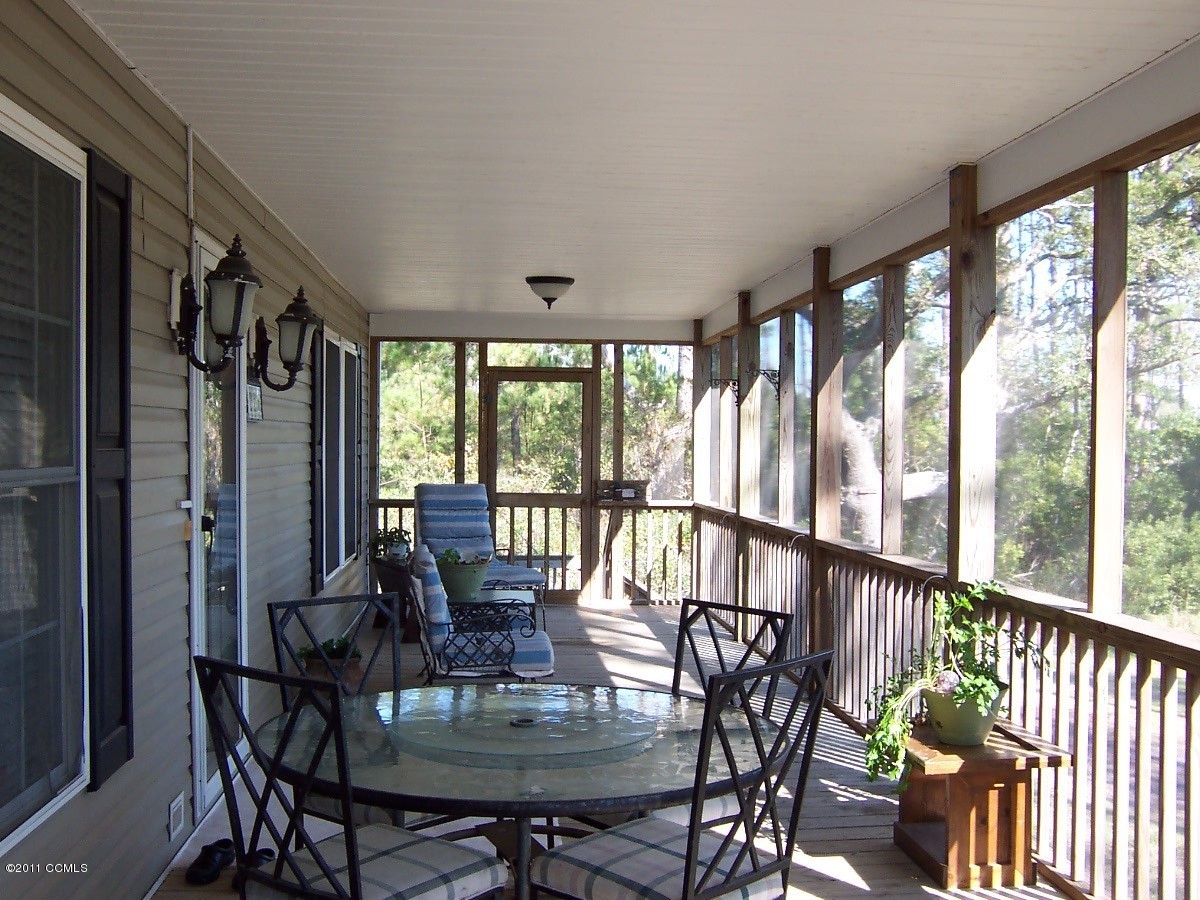 226 Community Road Davis, NC 28524 - Photo 9 of 25 Screened Porch