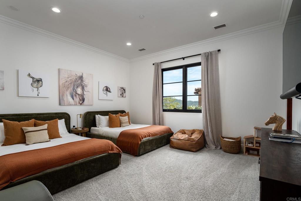 18000 Sunset Point Road Poway, CA 92064 - Photo 17 of 36 a bed room with two bed and a large window