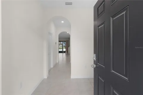 a view of a livingroom from a hallway