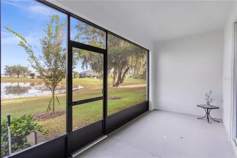 a view of an entryway with a tree in it