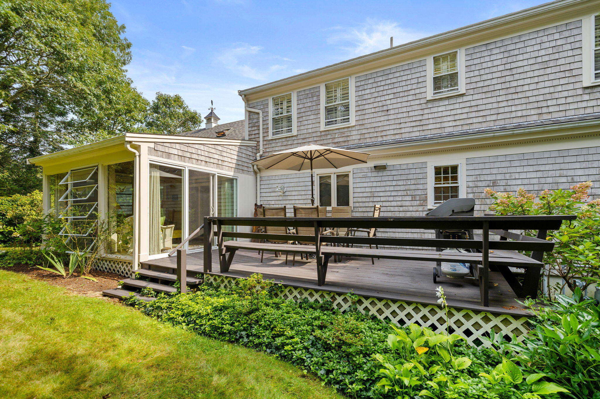 239 Chatham Road Harwich, MA 02645 - Photo 8 of 39 a front view of a house with a patio