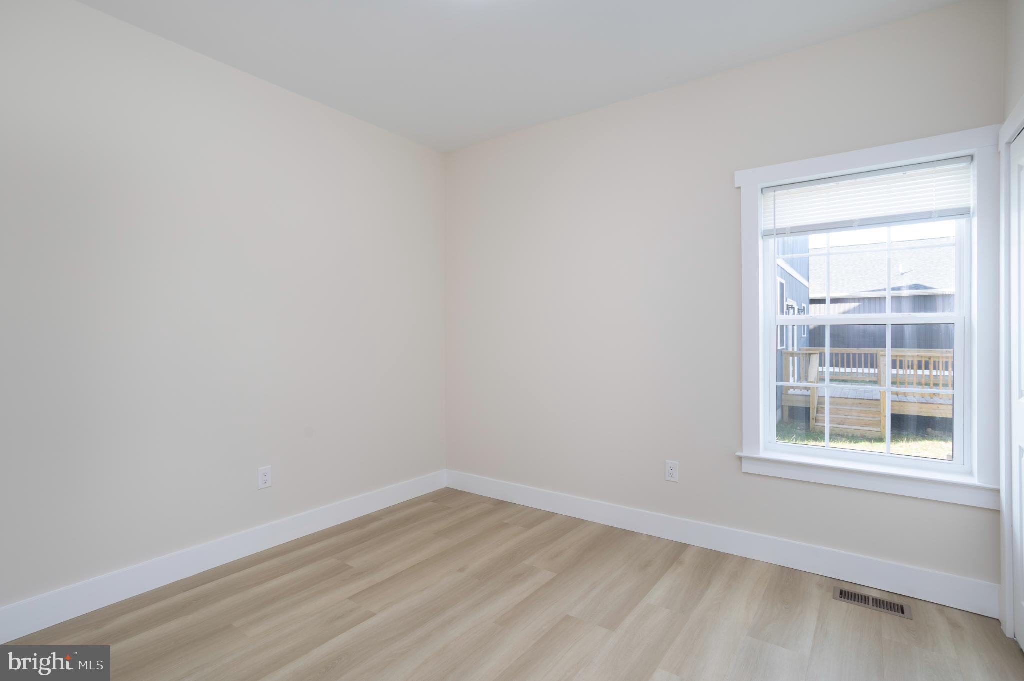 8 Sunrise Avenue Ridgely, MD 21660 - Photo 21 of 23 an empty room with a window
