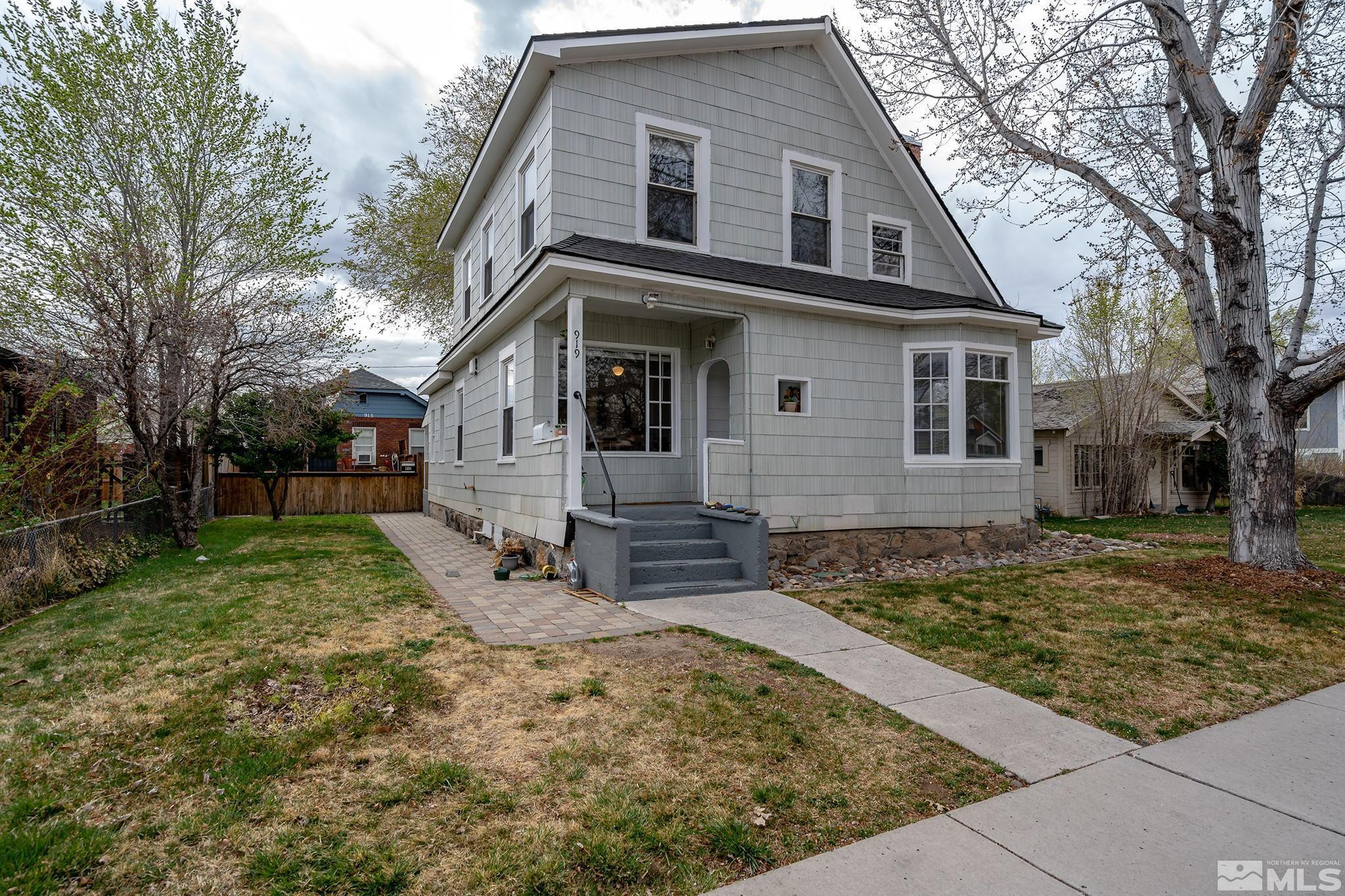 919-915 Bell Street Reno, NV 89503 - Photo 1 of 13 front view of a house with a yard
