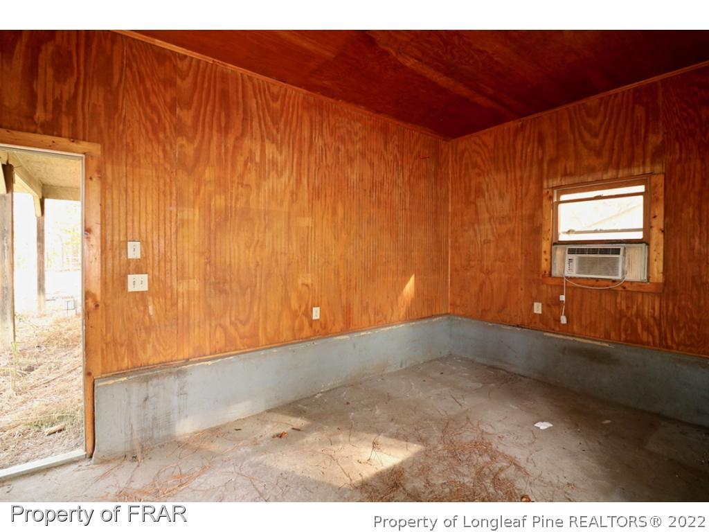 1548 Linden Road Aberdeen, NC 28315 - Photo 28 of 34 a view of an empty room and window