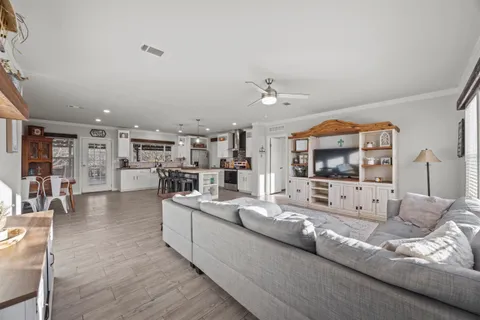 a bedroom with furniture a bed and a dresser