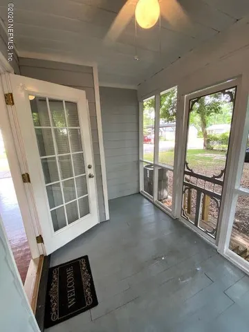 a view of an empty room and window