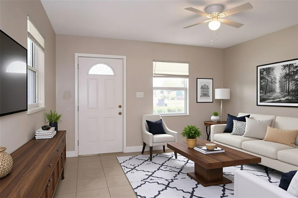 4109 West Arch Street Tampa, FL 33607 - Photo 2 of 14 a living room with furniture and wooden floor