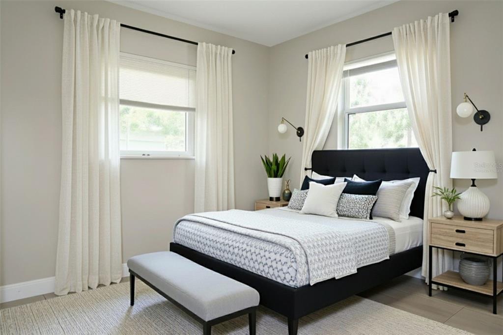 4109 West Arch Street Tampa, FL 33607 - Photo 4 of 14 a bedroom with a bed and a window