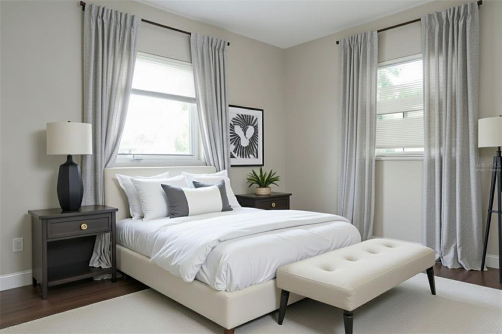 4109 West Arch Street Tampa, FL 33607 - Photo 5 of 14 a bedroom with a bed and a window