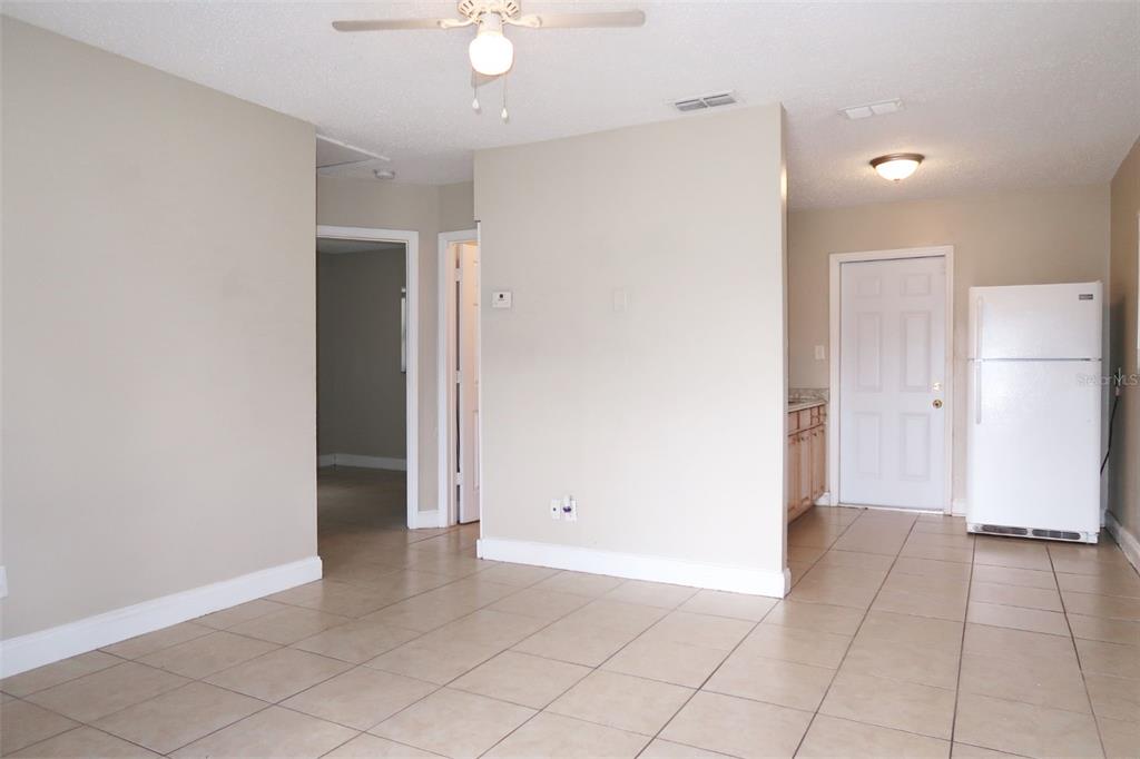 4109 West Arch Street Tampa, FL 33607 - Photo 9 of 14 an empty room with closet and a fan