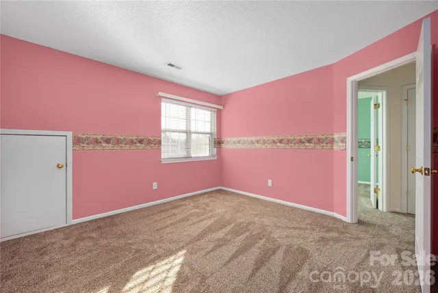 a view of empty room with window