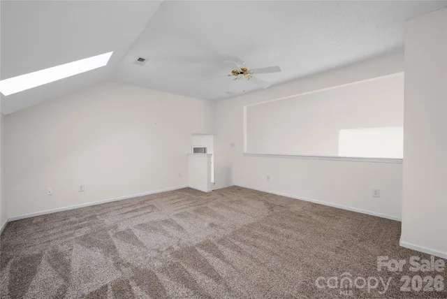 front view of a house with a garden