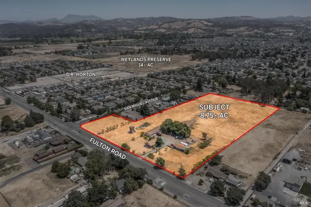 a view of a back yard of a house