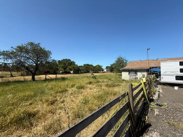 a view of ocean view with large trees
