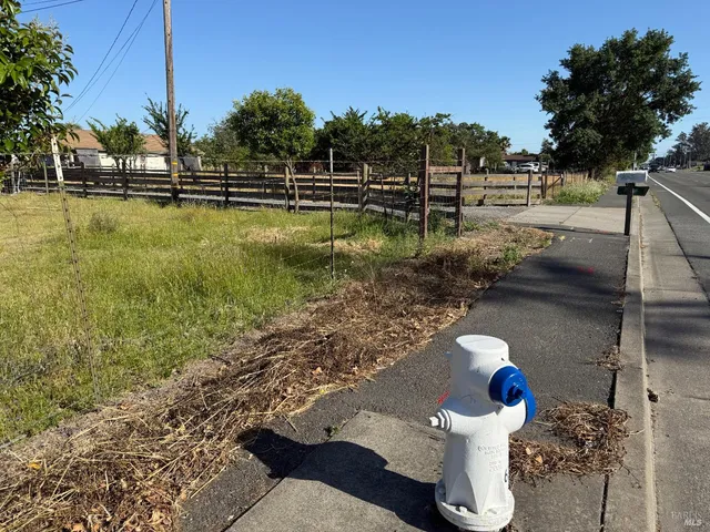a view of a lake with sitting area