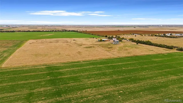 a bedroom with a bed and a view of bathroom