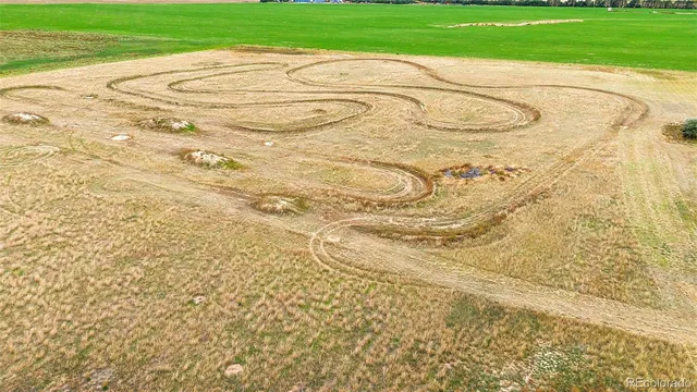 a view of a workspace with furniture