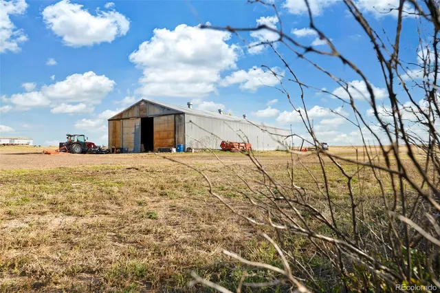 a kitchen with granite countertop stainless steel appliances and wooden cabinets