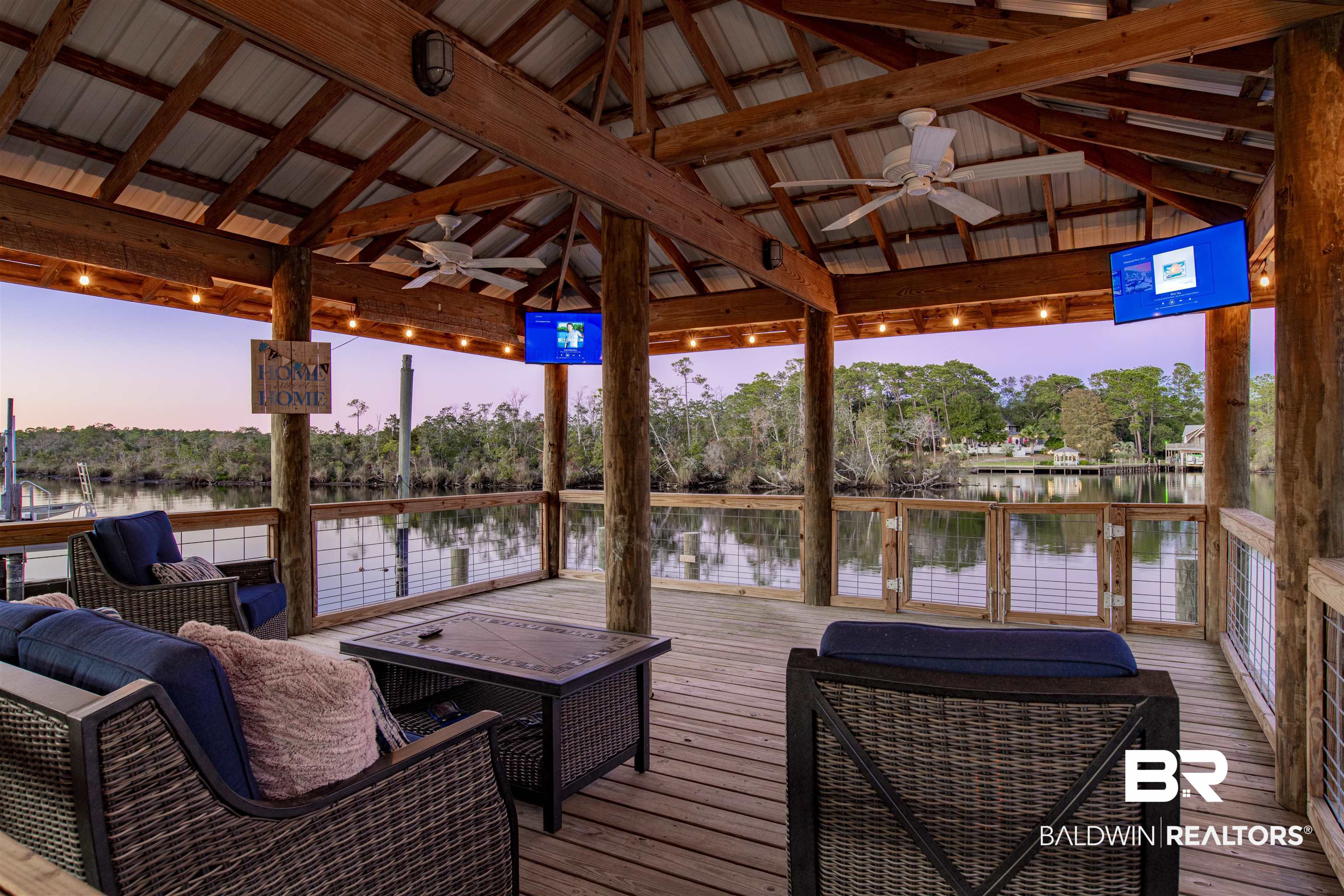 11463 Getchell Drive Theodore, AL 36582 - Photo 17 of 39 Exterior space with a gazebo, ceiling fan, a water view, and an outdoor living space with a fire pit