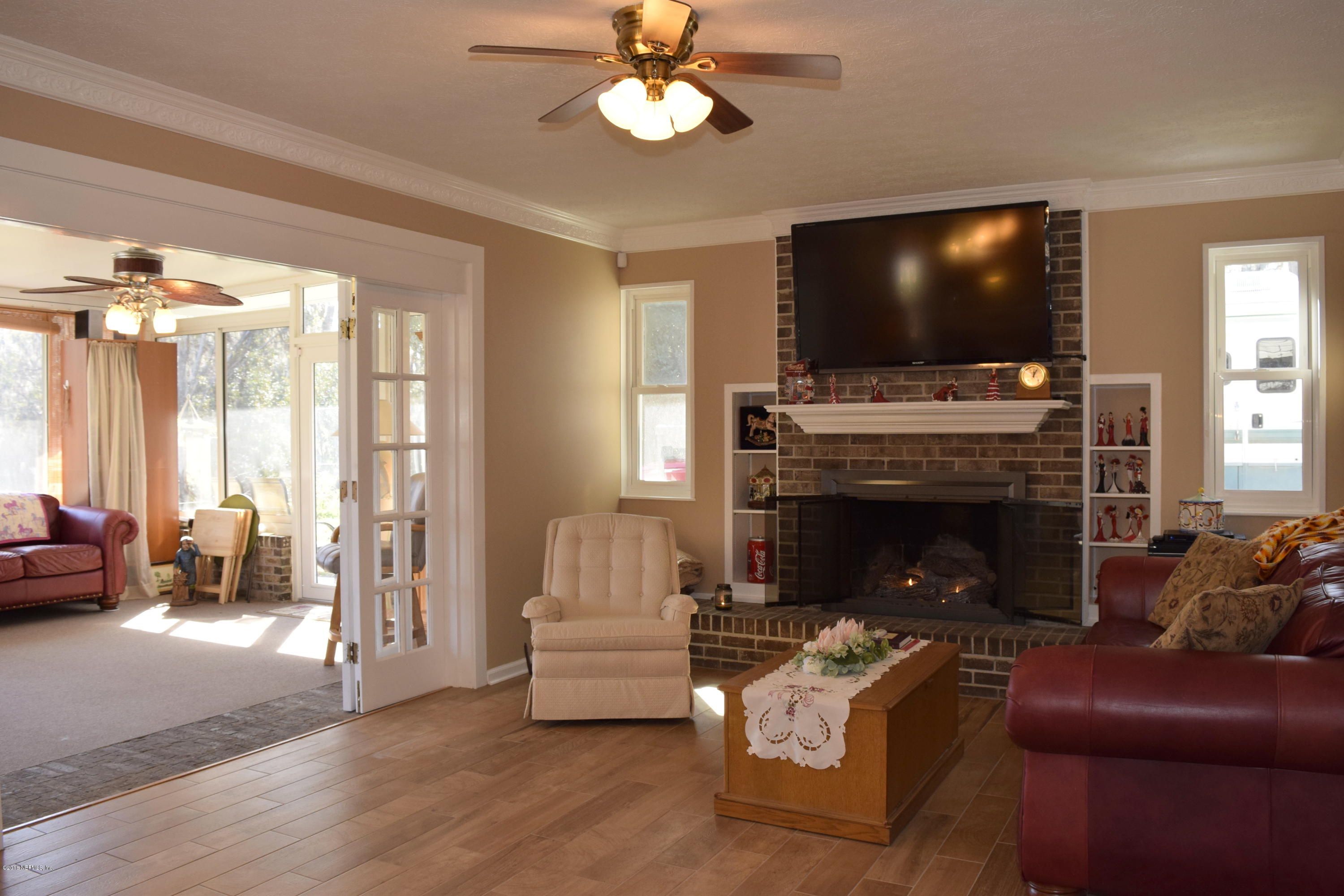 3569 Sheldon Road Orange Park, FL 32073 - Photo 30 of 85 family room to sun room
